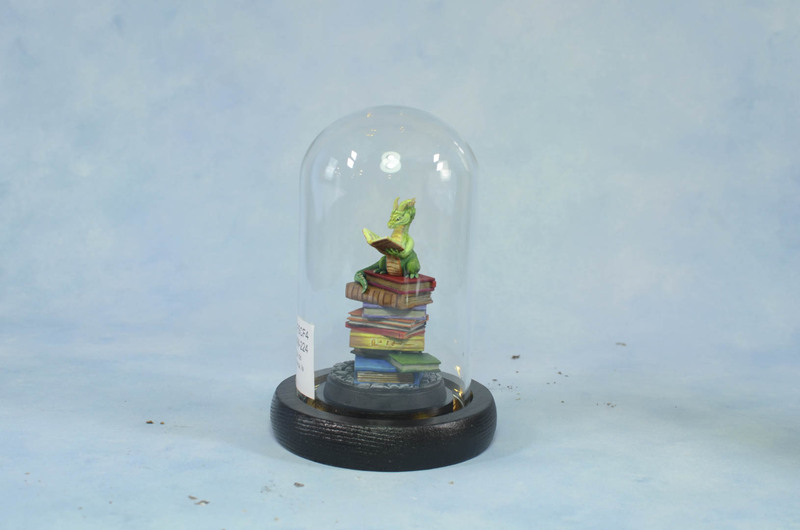 Dragón de biblioteca, la magia de los libros.